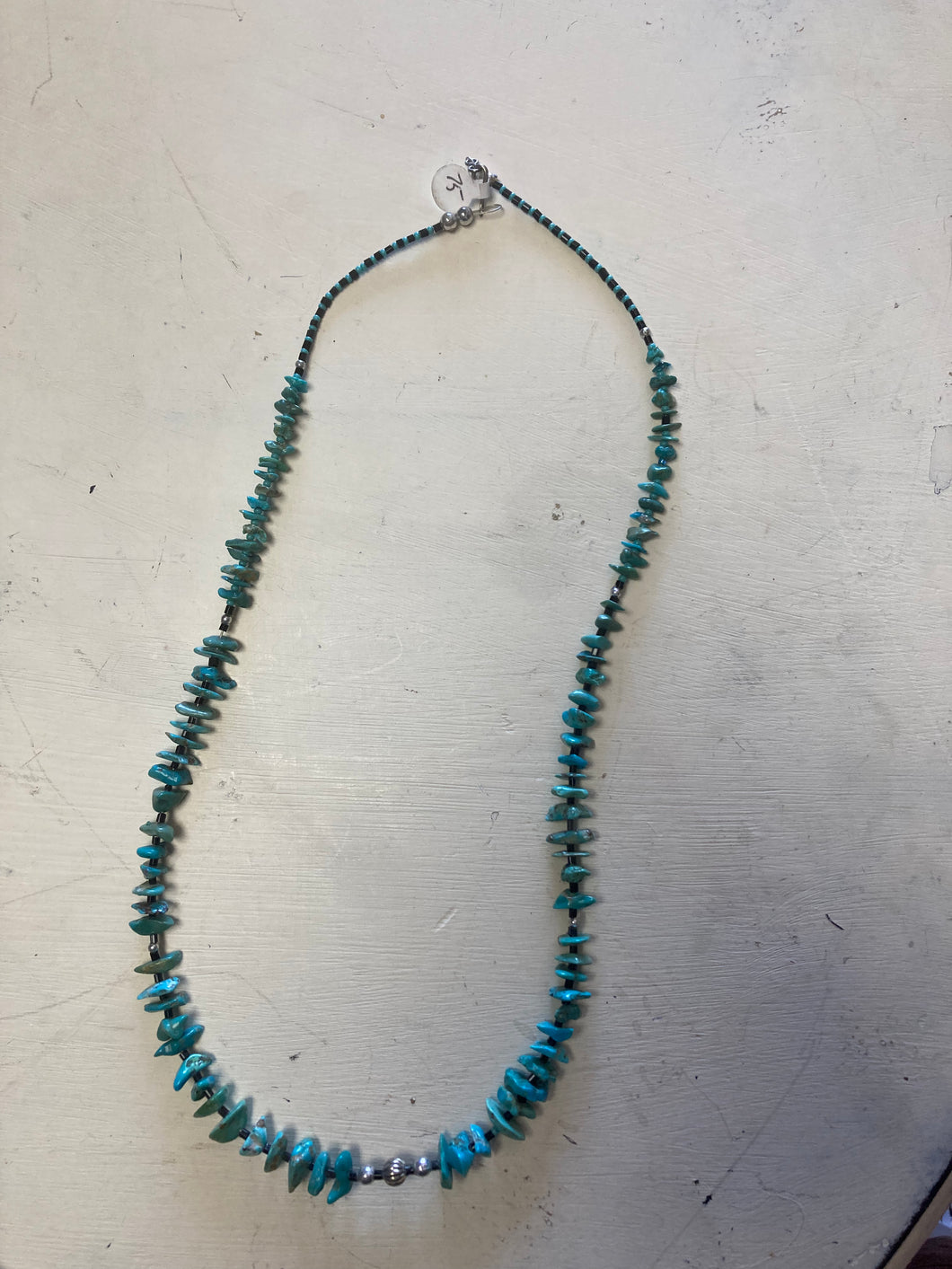 Turquoise necklace with silver ornaments