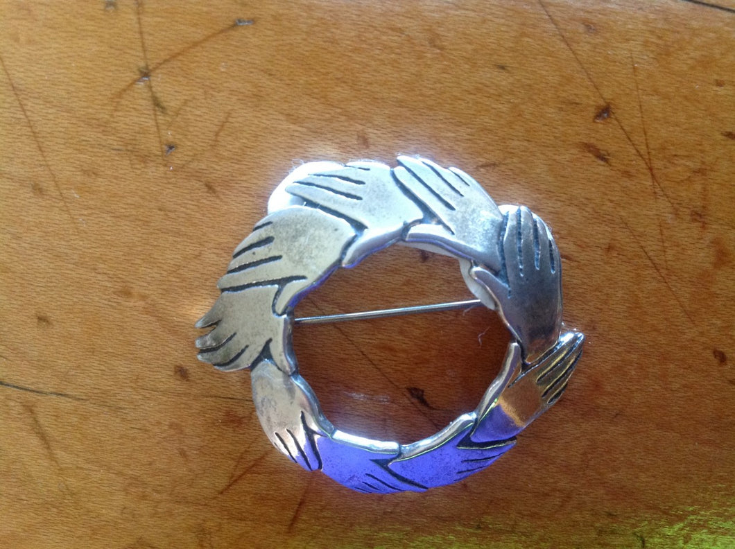 Sterling silver pin round united hands